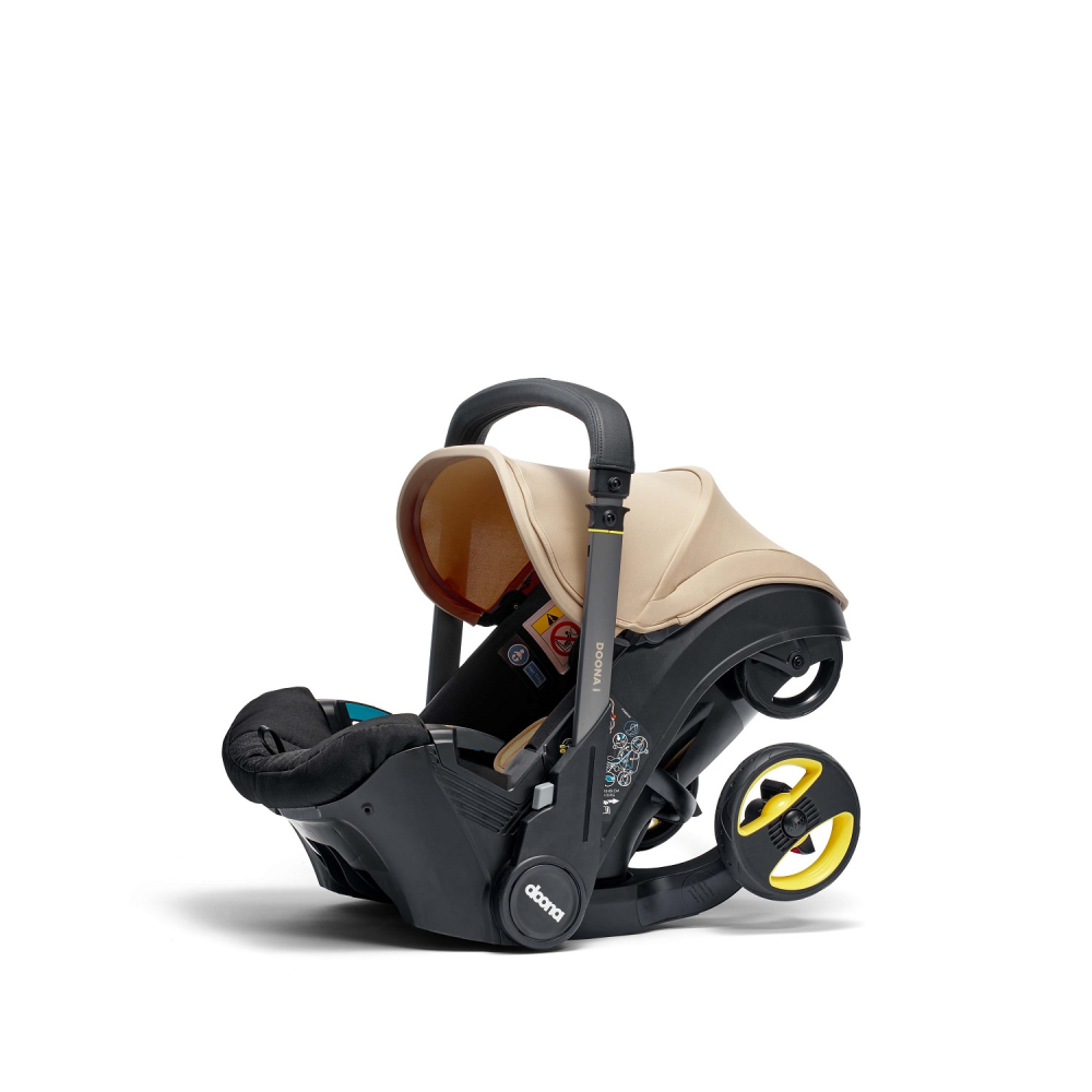 Automobilinė kėdutė - vežimėlis Doona i, 0-13 kg, Sahara Sand-Automobilinės kėdutės, 0-13 kg-e-vaikas