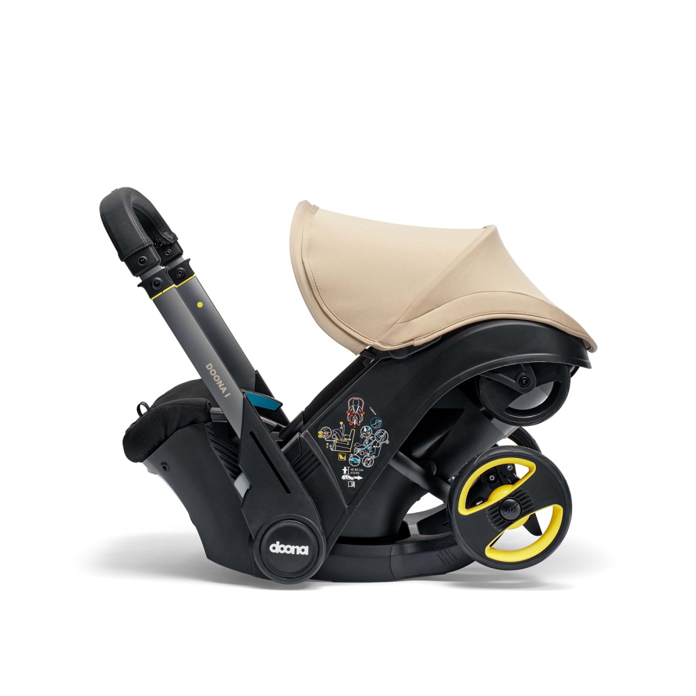 Automobilinė kėdutė - vežimėlis Doona i, 0-13 kg, Sahara Sand-Automobilinės kėdutės, 0-13 kg-e-vaikas
