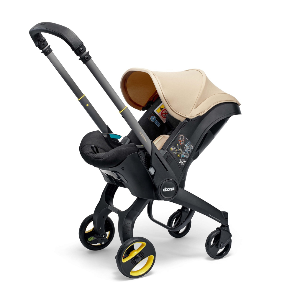Automobilinė kėdutė - vežimėlis Doona i, 0-13 kg, Sahara Sand-Automobilinės kėdutės, 0-13 kg-e-vaikas