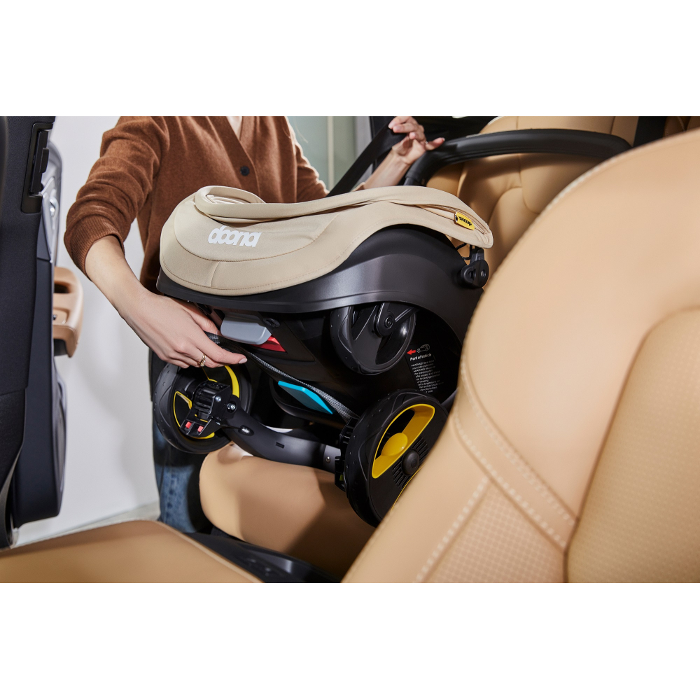 Automobilinė kėdutė - vežimėlis Doona i, 0-13 kg, Sahara Sand-Automobilinės kėdutės, 0-13 kg-e-vaikas