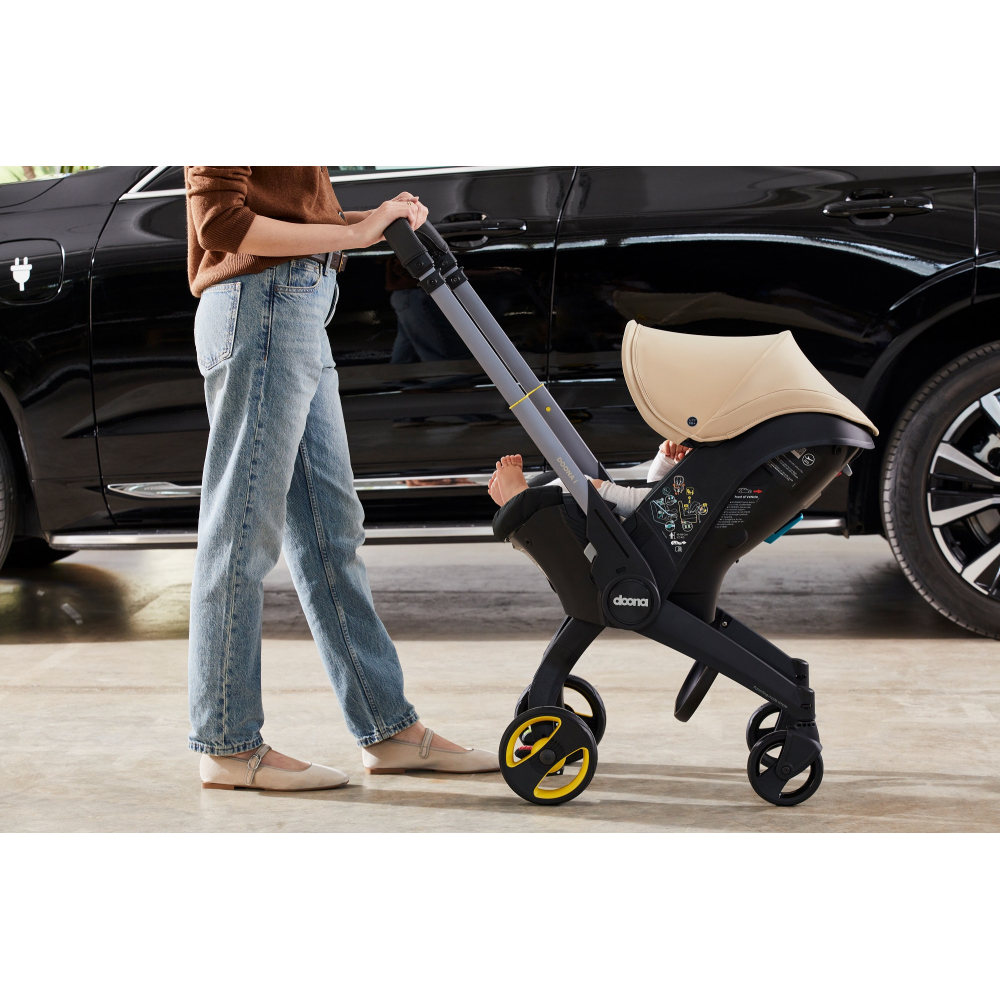 Automobilinė kėdutė - vežimėlis Doona i, 0-13 kg, Sahara Sand-Automobilinės kėdutės, 0-13 kg-e-vaikas