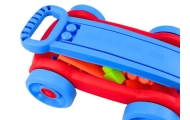 Set of blocks in a blue and red wheeled cart