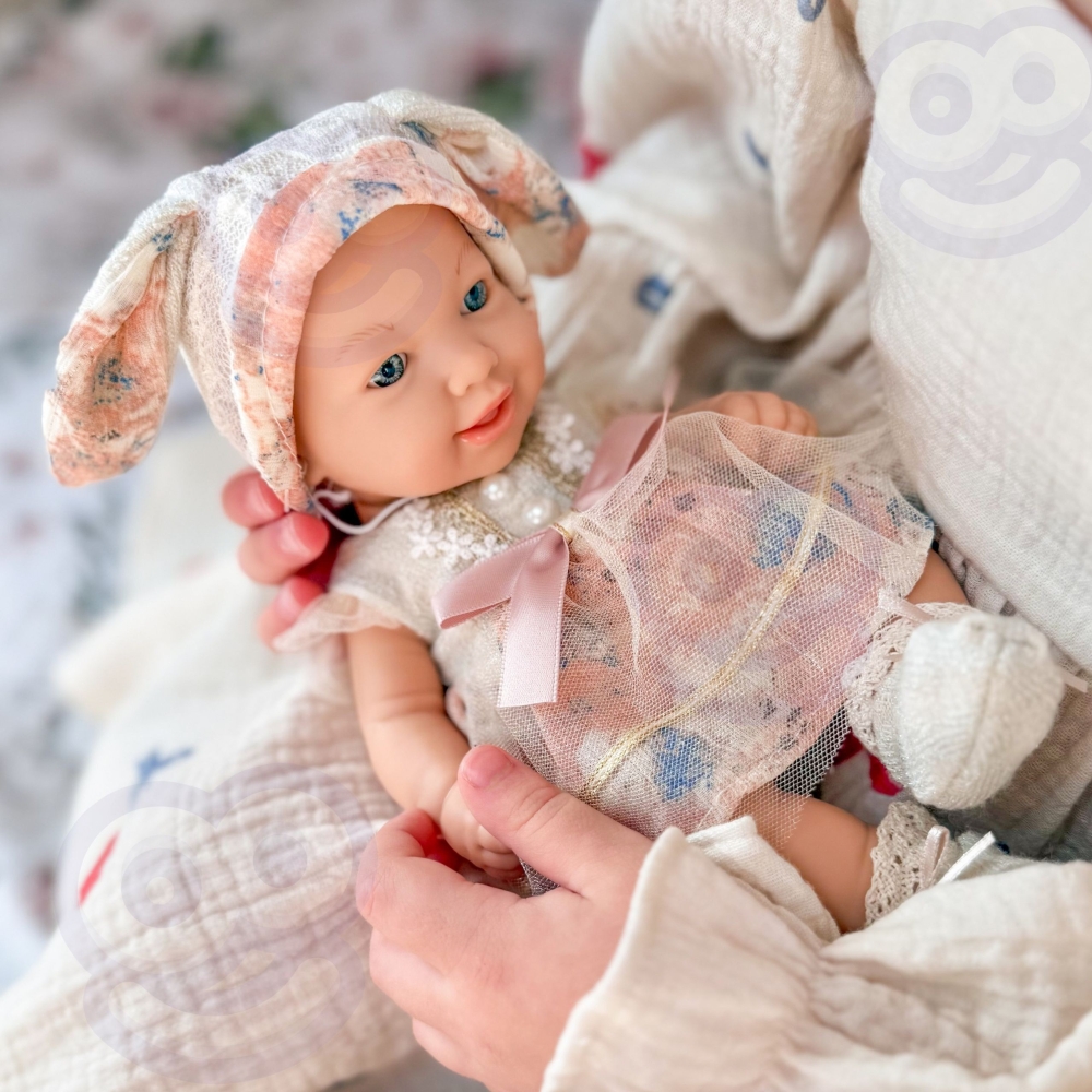 Lėlė kūdikis WOOPIE ROYAL 24 cm su zuikio suknele ir kepuraite