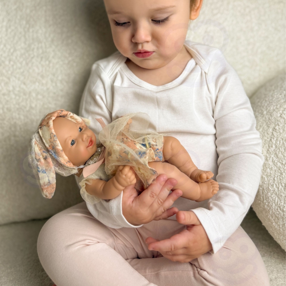 Lėlė kūdikis WOOPIE ROYAL 24 cm su zuikio suknele ir kepuraite