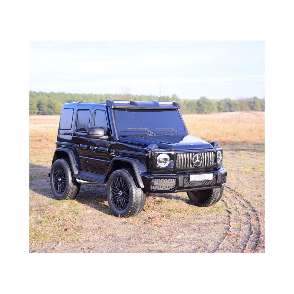 MILŽINIŠKAS „MERCEDES G63“ SU 800 W AKUMULIATORIUMI, 2X24 V, KILIMĖLIAI, LAKAS /DKG63