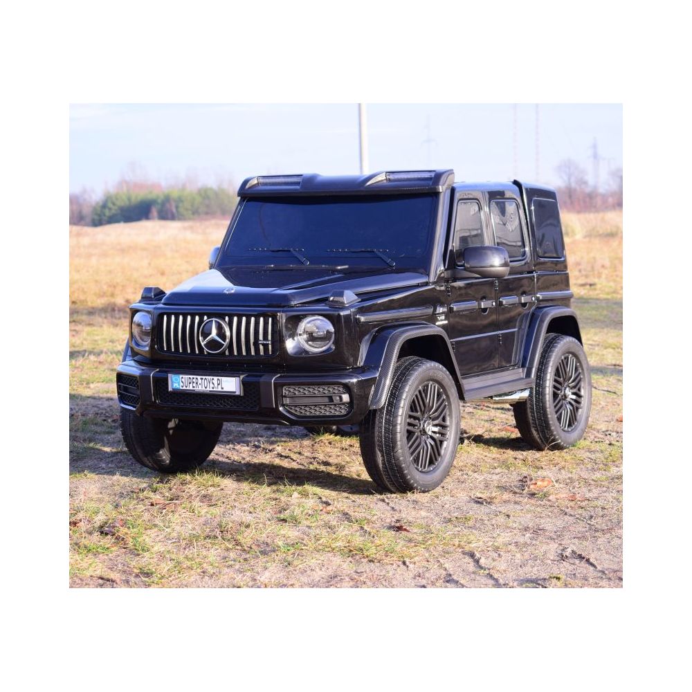 MILŽINIŠKAS „MERCEDES G63“ SU 800 W AKUMULIATORIUMI, 2X24 V, KILIMĖLIAI, LAKAS /DKG63