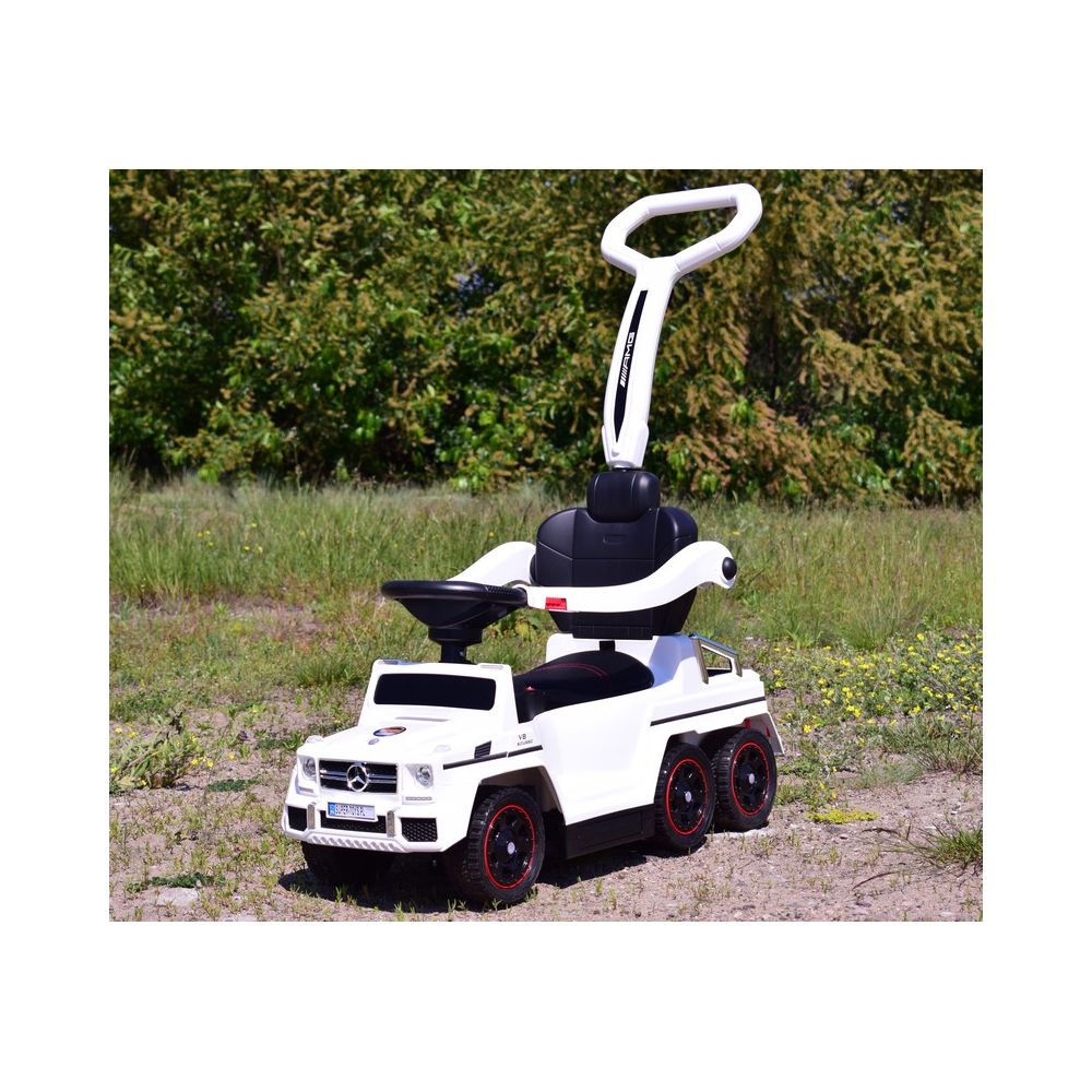 JEŹDZIK NA AKUMULATOR, PCHACZ, ODPYCHACZ MERCEDES G 63 AMG 6X6, MIĘKKIE KOŁA, DASZEK , STEROWANIE RĄCZKĄ /1838 LONG
